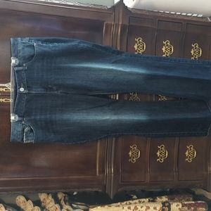 Maurices jeans with decorative button pockets on the butt. Women's size 18.